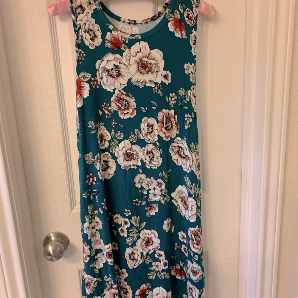 Maurice’s sleeveless green dress